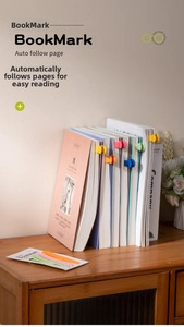 Close-up of colorful soft silicone automatic following bookmarks on a wooden shelf