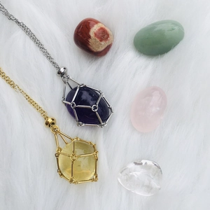 Adjustable crystal stone holder necklaces in gold and silver with assorted polished gems