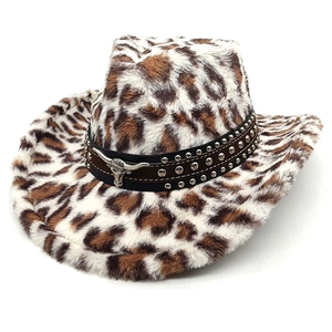 Close-up of leopard faux fur western cowboy hat with studded leather band and bull head