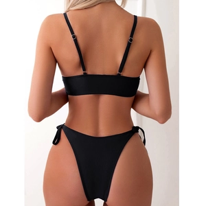 Rear view of black bikini set featuring thin straps and adjustable side-tie bottoms