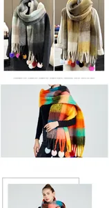Detail view of colorful plaid winter scarf with vibrant thick tassels and soft knit texture