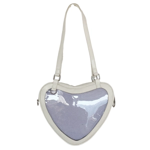 Detail view of heart-shaped ita bag with transparent window and white faux leather finish