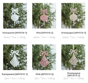 Sparkly Christmas tree hanging ornaments in spiral and wave shapes, various colors
