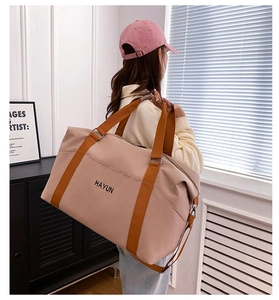 Large capacity waterproof yoga travel bag in dusty pink with Hayun logo and shoulder strap