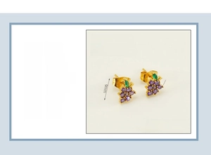 Detail of grape-shaped stud earring with purple and green zircon in 18K gold plated steel
