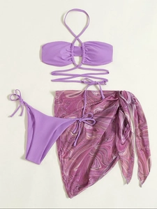 Three-piece purple bikini set with halter top, side-tie briefs and marble mesh skirt cover-up