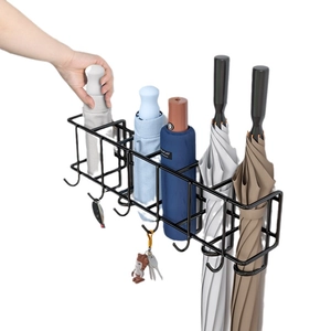 Wall-mounted black metal umbrella rack with five slots and hooks for entry storage