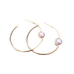 Minimalist gold plated circular pearl earrings with sleek round ring hoop design