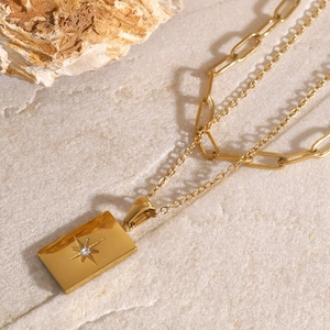 Gold double-layered stainless steel necklace with paperclip chain and star pendant