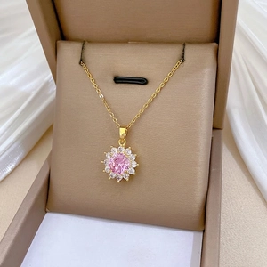 Elegant gold titanium steel necklace with a sparkling pink sunflower crystal pendant
