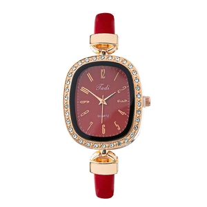 Elegant ladies quartz watch with red leather strap and rhinestone rose gold oval dial