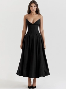 Elegant black strapless evening dress with corset bodice and pleated flowy skirt