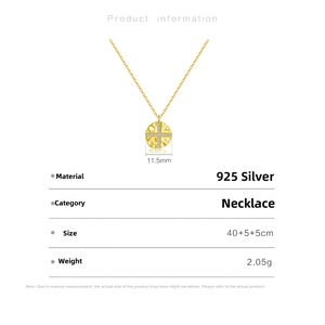 Detail view of a 925 sterling silver gold necklace with a 11.5mm cross pendant