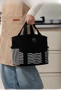 Detail showing portable double handle design and wave pattern on insulated lunch bag