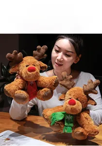 Close-up of plush Christmas reindeer toy with soft festive scarf held by hands