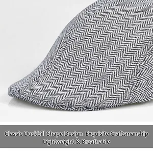 Classic grey herringbone flat cap with a vintage newsboy style and textured wool fabric