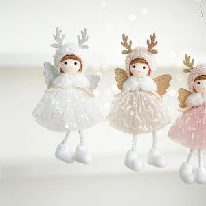 Three plush Christmas angel dolls in white, beige, and pink with sequined wings