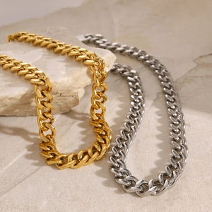 Chunky 11mm Cuban link chain necklace in 18k gold and silver stainless steel finish