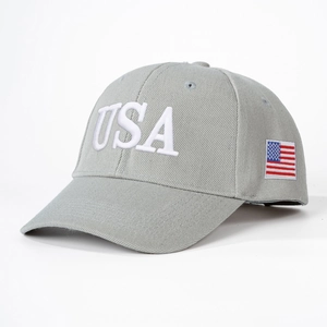 Grey baseball cap with white USA 3D embroidery and American flag side patch on white background