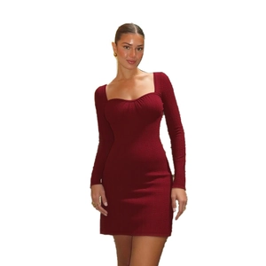 Close-up of wine red ribbed knit dress featuring a classic square neckline and long sleeves