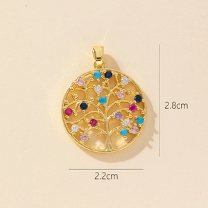 Detail shot of a Tree of Life pendant with colorful gems and size markings