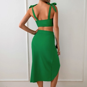 Rear view of bright green three-piece bikini set with tie-up top and high slit skirt