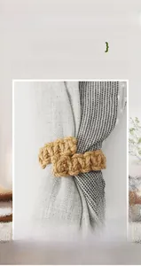 Macro shot of hand woven natural jute curtain tieback texture and material detail