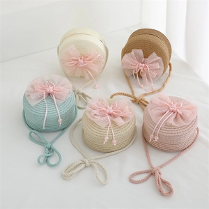 Kids woven straw handbags with cute mesh bows and pearls in diverse pastel summer colors