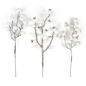 Three white frosted berry stems for Christmas tree decoration with realistic snow flocking