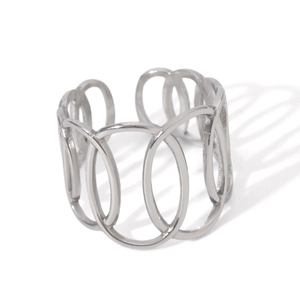 Macro detail of geometric linked oval rings in silver stainless steel finish