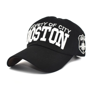 Detailed view of 3D embroidery on black cotton baseball cap with Boston city text