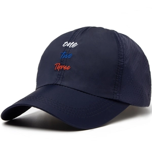 Navy blue quick-dry baseball cap with letter embroidery and laser-cut vents