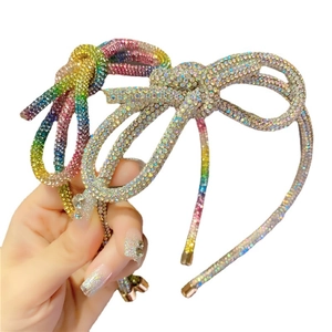 Sparkling rainbow rhinestone bow headband and silver crystal hair accessory for women