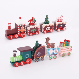 Two sets of decorative wooden Christmas trains with colorful gingerbread and snowman figures