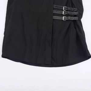 Fashionable black poplin shirt hem with triple silver buckle strap detail and stitching