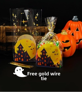 Detail showing Halloween treat bags with castle prints, including golden twist ties