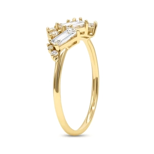 Close-up of golden ring featuring rectangular and round cluster diamond setting on band