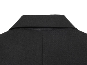 Close-up of black suit jacket lapel showing high-quality twill fabric texture and stitching