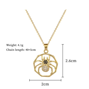 Spider web necklace with clear and black stones and detailed size measurements