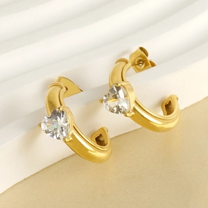 Elegant 18k gold plated C-shaped earrings with large heart zircon on champagne velvet