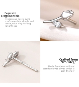 Macro detail of tulip silver stud earrings showing S925 hallmark and zircon leaf
