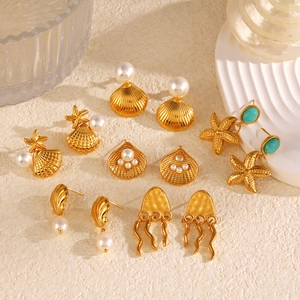 Golden ocean series earrings set with seashells, starfish and pearls for beach vacation