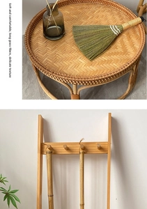 Macro shot of natural grass silk broom with handwoven rattan handle and wall hook