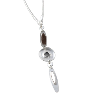 Modern irregular silver pendant necklace with geometric enamel disc on a sleek snake chain