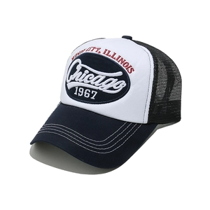 Detail of Chicago 1967 embroidery on a vintage navy and white mesh trucker hat