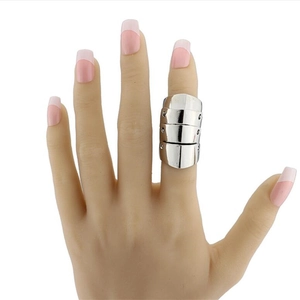 Silver punk style multi-link armor ring on hand with articulated gothic metal joints