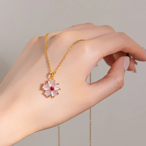 Pink cherry blossom pendant necklace in gold titanium steel with cat eye stone floral charm