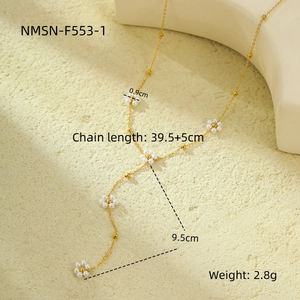 Detail view of gold flower pearl necklace with chain length and pendant size dimensions