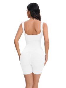 Detailed back view of white ribbed knit yoga bodysuit featuring a deep U-shaped open back