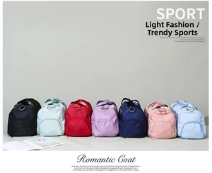 Macro shot of waterproof nylon sports bags in seven colors with side zippers